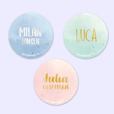 Ronde aquarel naamstickers met goud/zilver